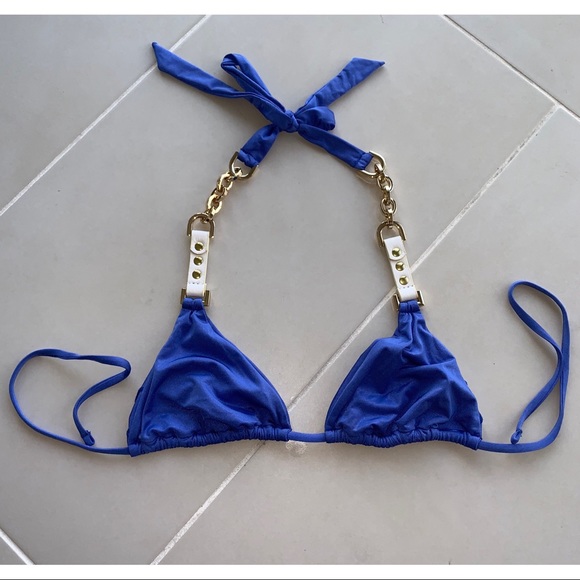 Beach bunny bikini top size Medium in color blue